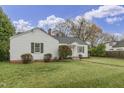White house with gray roof and well maintained lawn at 507 E Davis St, Smithfield, NC 27577