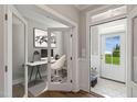 Home office with glass French doors and hardwood floors at 72 Macy Circle, Wendell, NC 27591