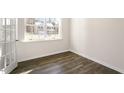 Spacious office with hardwood floors and large window at 900 Canis Minor Rd, Wendell, NC 27591
