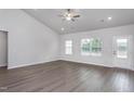 Spacious living room with high ceilings and wood-look flooring at 11300 International Dr, Middlesex, NC 27557