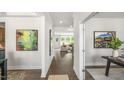 Bright hallway with hardwood floors and access to living areas at 310 Umstead St, Sanford, NC 27330