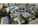 Aerial view of community amenities, including pool and tennis courts at 160 Babbling Brook Dr, Clayton, NC 27520