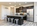 Modern kitchen with stainless steel appliances and an island at 170 Vega Loop, Sanford, NC 27330