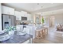 Open concept kitchen with island, dining area, and living room view at 2018 Cross Bones Blvd # 28, Durham, NC 27703