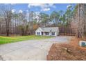 House with a long driveway and wooded area at 2504 Patton Lane Ln, Franklinton, NC 27525