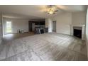 Open plan living and dining area adjacent to kitchen at 193 Magnolia Run Way, Benson, NC 27504