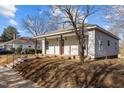 Side view of a charming home with a covered front porch and updated siding at 112 Edgewood Dr, Roxboro, NC 27573