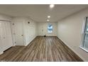 Spacious living room with hardwood floors and lots of natural light at 2816 Smoke Pl, Raleigh, NC 27610
