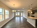 Spacious living room with hardwood floors and lots of natural light at 523 Eversden Dr, Zebulon, NC 27597