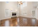 Large living room with hardwood floors, high ceilings and access to a deck at 65 Sundew Ct, Clayton, NC 27527