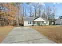 Exterior of the house with a long driveway at 204 Barbour Rd, Smithfield, NC 27577