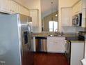 Kitchen with stainless steel appliances and granite countertops at 513 Port Dr, Henderson, NC 27537