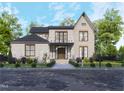 Modern two-story house with a stylish facade and landscaping at 684 Golfers Vw, Pittsboro, NC 27312