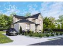 Luxury home exterior with driveway and landscaping at 684 Golfers Vw, Pittsboro, NC 27312