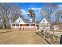 Ranch home with front porch and two car garage at 101 Creekside Dr, Selma, NC 27576