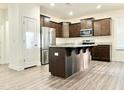 Modern kitchen with stainless steel appliances and island at 121 Blackthorn Ln, Angier, NC 27501