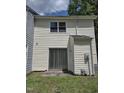 Back of house with sliding glass door and patio at 346 Kilarney Dr, Durham, NC 27703