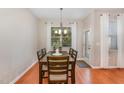 Charming dining area with hardwood floors and access to backyard at 2722 Evanston Ave, Durham, NC 27703