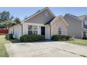 House exterior with a gray and beige color scheme at 1732 Great Bend Dr, Durham, NC 27704