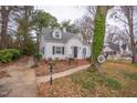 House exterior showcasing walkway and landscaping at 421 S Morgan St, Roxboro, NC 27573