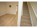 Carpeted staircase leading to the upper level at 421 S Morgan St, Roxboro, NC 27573