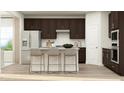 Modern kitchen with dark brown cabinets, granite countertops, and island at 612 Emerald Bay Cir, Raleigh, NC 27610