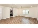 Spacious bonus room with hardwood floors and access to a small bathroom at 79 Stallion Way, Benson, NC 27504