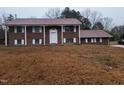 Brick ranch house with attached garage and large yard at 1815 Bethlehem Rd, Rocky Mount, NC 27803