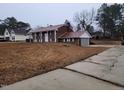 House with attached garage and driveway at 1815 Bethlehem Rd, Rocky Mount, NC 27803