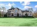 Impressive two-story brick home with a spacious front yard at 193 N Grande Overlook Dr, Clayton, NC 27527