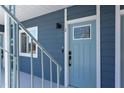 Light blue building exterior with a single unit entrance at 1309 Hudson Ave # D10, Durham, NC 27705