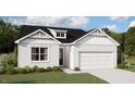 Two-story home with white siding, black roof, and a two-car garage.Landscaped yard with shrubs at 124 Little Creek Dr, Lillington, NC 27546