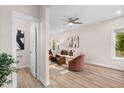 Spacious living room with hardwood floors and a ceiling fan at 1917 A Essex, Durham, NC 27704