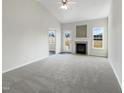 Spacious living room with high ceilings and neutral carpeting at 315 Moonlight Dr, Fuquay Varina, NC 27526