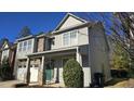 Two-story house with gray siding and a screened porch at 1137 Rosepine Dr, Cary, NC 27519