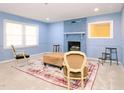 Living room with fireplace and two armchairs at 1354 Mudham Rd, Wendell, NC 27591
