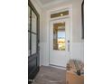 Modern front door with glass panels and black sidelights at 1833 Ballard Rd # Clayton Craftsman, Fuquay Varina, NC 27526