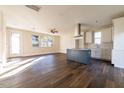 Open concept kitchen with island and stainless steel appliances at 2407 Hart St # A, Durham, NC 27703