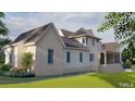 Back view of house showcasing stone and large windows at 1419 Ridge Rd, Raleigh, NC 27607
