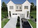 Two story house with a two-car garage and landscaping at 2709 Fayetteville St, Durham, NC 27707