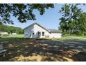 House exterior with deck and side yard at 10782 S Nc 62 Hwy, Burlington, NC 27217