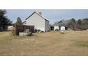 Large backyard with detached shed and fire pit at 1279 Frank Wicker Rd, Sanford, NC 27332