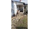 Front porch with stone pathway and potted plants at 1279 Frank Wicker Rd, Sanford, NC 27332