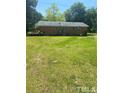 Brick ranch house with a large backyard at 1058 Sanders Rd, Sanford, NC 27332