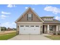 Two-story home with a two-car garage at 71 Hillwood Dr, Sanford, NC 27332