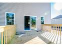 Wooden deck with sliding glass door access to the house at 533 Stadium Dr, Cameron, NC 28326