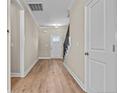 Light and bright entryway with stairs leading to the second floor at 147 Hillwood Dr, Sanford, NC 27332