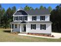 Two-story white house with black shutters at 117 Godwin Ct, Sanford, NC 27330