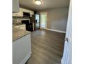 Eat-in kitchen with granite countertops and stainless steel appliances at 1277 Nc 24 Hwy, Cameron, NC 28326