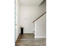 Entryway with wood-look floors and staircase at 100 Chandler Ct, Sanford, NC 27330